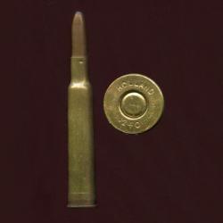.240 Holland Magnum Flanged - marquage : HOLLAND 240 - balle cuivre pointe plomb - étui de 63.4 mm