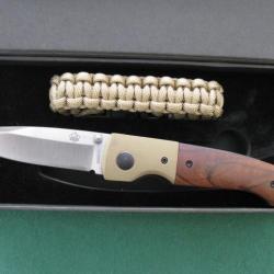 Couteau pliant Puma TEC de luxe Solingen Germany en coffret carton avec bracelet corde de survie