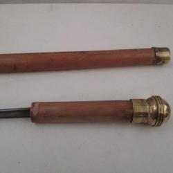 une  canne épée 90 cm fut en bambou  pommeau en laiton  lame  a 3 pans creux  de 48 cm poids 400 gr