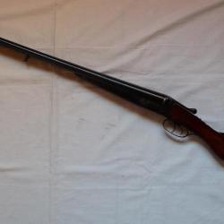 Fusil de chasse ancien  juxtaposé de calibre 12.  Signé "Goursat à Brive". Canons de St Etienne