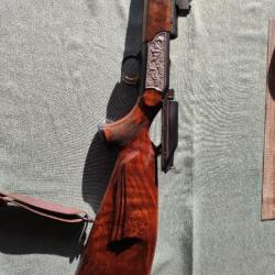 Carabine blaser r93 Bois grade 8  calibre 300 point rouge zeiss gâchette plaqué or écusson cerf