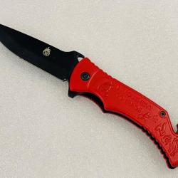 Couteau de poche sécurité Pompier,manche alu sculpté dévouement & courage rouge.