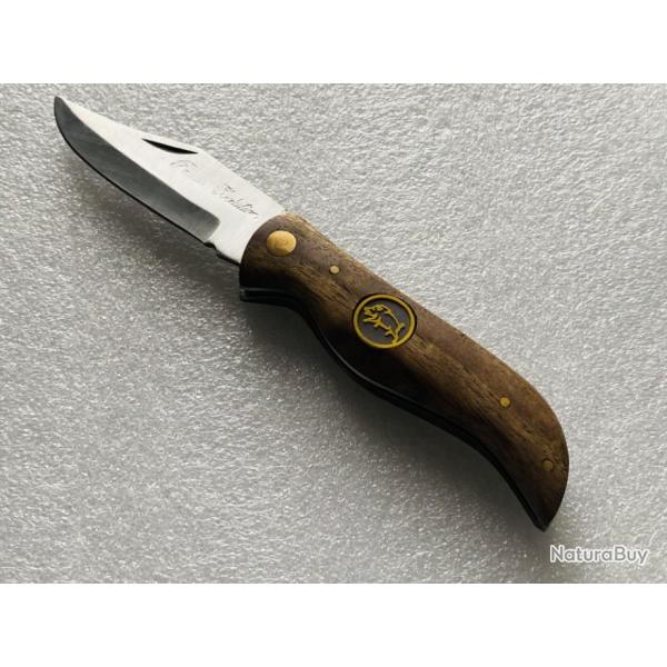 Couteau de poche avec manche bois de palissandre et motif sanglier.