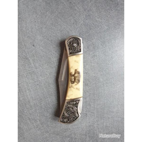 couteau pliant  jkr ,  manche avec motif sanglier, lame en inox de 8cm  total longueur 18.5 cm