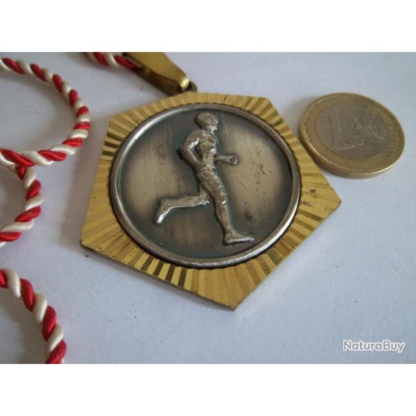 Mdaille Athltisme 41 grs (centre argent..pourtour "or")