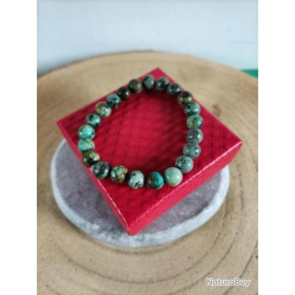Bracelet en pierre naturelle Turquoise Africaine perles 8 mm avec crin Rf : N30