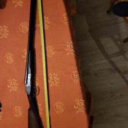Fusil de chasse juxtaposé VICKERS calibre 12 crosse anglaise, clef fermeture représentant une biche