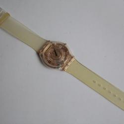 SWATCH Montre extra plate Swatch Skin Golden Jelly SFK101
