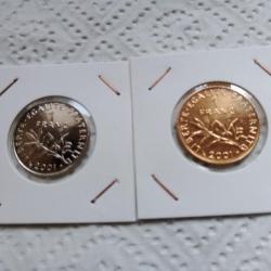 lot de 2 pièces de 1 franc 2001 dont 1 dorée à l'or fn