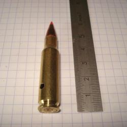 une cartouche de 6.8 remington SPC neutralisée ogive pointe plastique étui percé amorce percutée