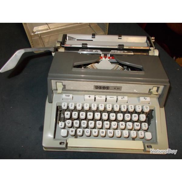 Machine  crire OLIVETTI en trs trs bon tat et parfaitement fonctionnelle