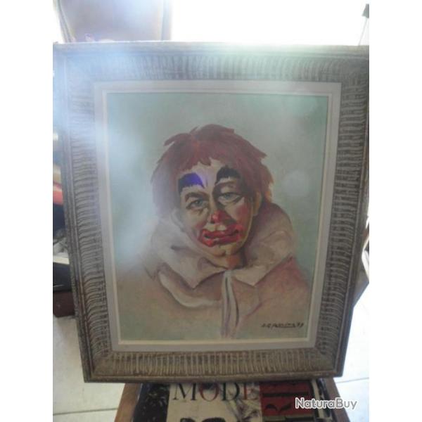 peinture  l'huile d'un clown triste signe j c puvira 1979