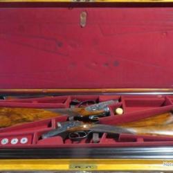 Paire de fusils Holland & Holland Royal Borgnes cal.12/65 canons 76.5 cm 1/4 1/2 + mallette