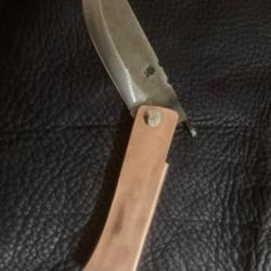 Couteau pliant à friction lame acier xc75 manche en cuivre