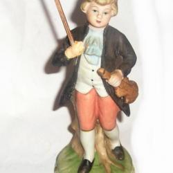 STATUETTE EN BISCUIT JEUNE MUSICIEN DU XVIIIème