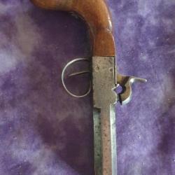 pistolet de poche dit coup de poing vers 1840