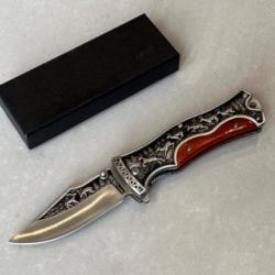 Couteau vintage marron motif chasse pliant 23cm columbia enchère