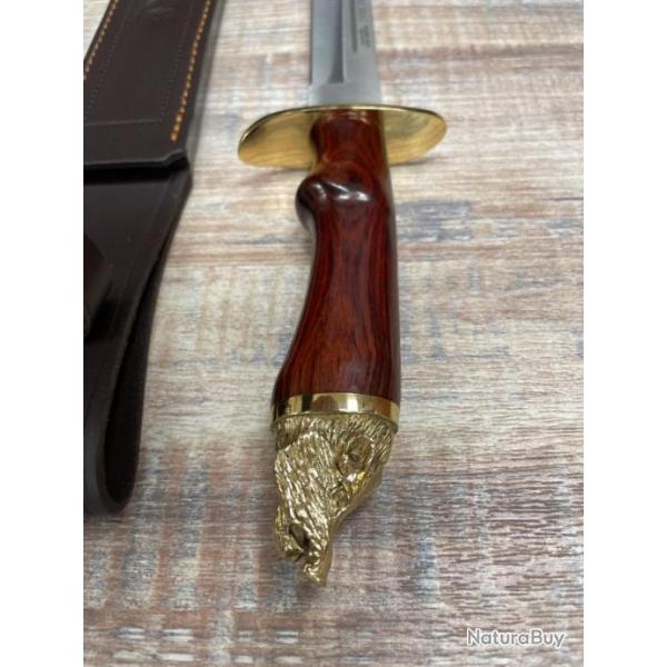 DAGUE DE CHASSE MUELA MICARTA ROUGE AVEC TETE DE SANGLIER DOREE