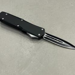 Couteau automatique acier OTF double tranchant noir et blanc