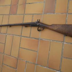 UN FUSIL DE CHASSE CAL 28 A BROCHE