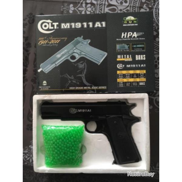 Pistolet  billes plastiques  ressort