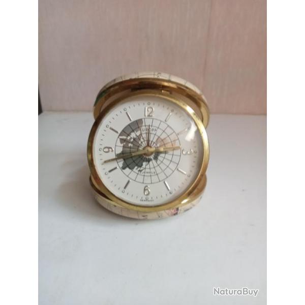 reveil ancien diamtre 8 cm fonctionne reprsente le monde