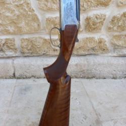 Vend browning 525 sporting en super état avec 5 chose plus 2 kicks smoke....