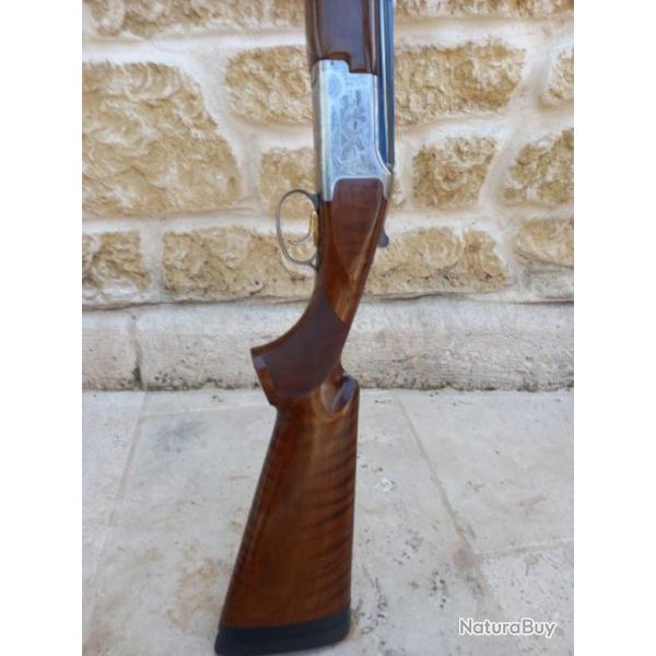 Vend browning 525 sporting en super tat avec 5 chose plus 2 kicks smoke....