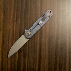 VEND WE KNIFE CHARITH BLUE TITANIUM CPM 20CV