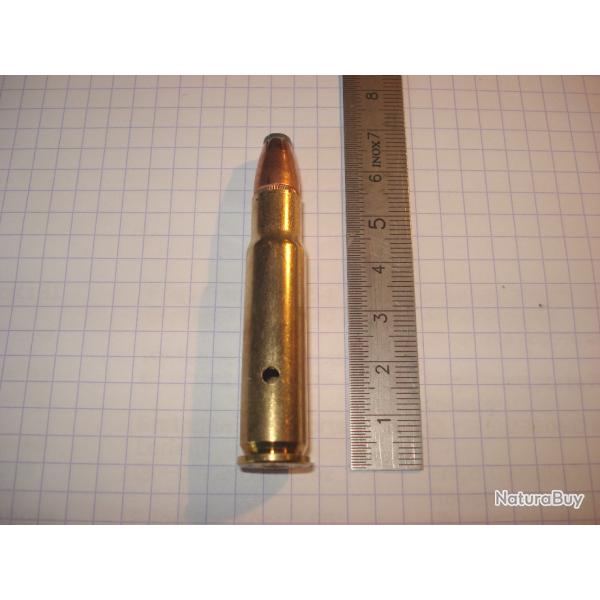 une cartouche de 356 winchester, neutralise, tui perc, amorce percute, ogive demi blinde