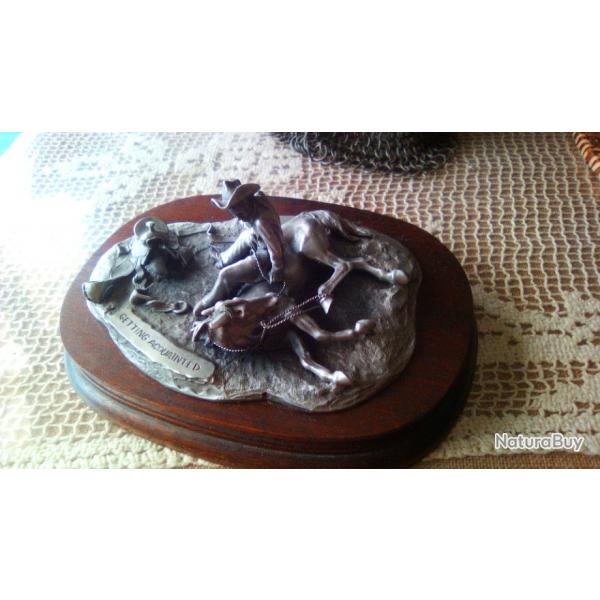 Statuette en tain reprsentant le dressage d un cheval dans l ouest amricain