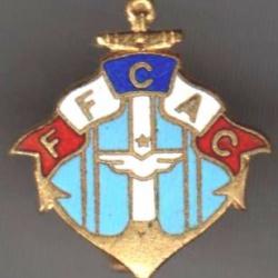 FFCAC. SM. Fédération Française des Coloniaux et Anciens Coloniaux. 22 X 18 mm. Insigne de boutonniè