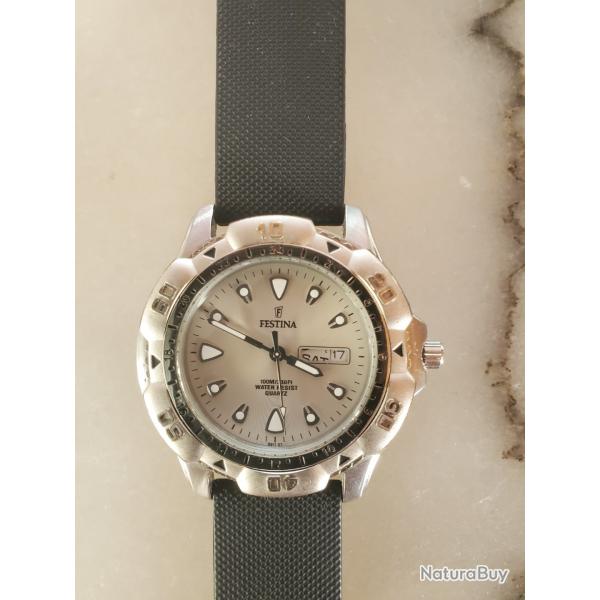 Montre de plonge Festina quartz tanche 10 ATM fonctionne parfaitement .
