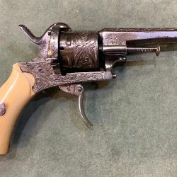 Revolver à broche