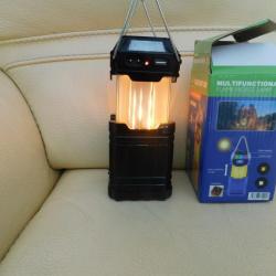 ENCHERE LAMPE SOLAIRE NOIRE POUR CAMPING TOTALEMENT AUTONOME 4 EN 1