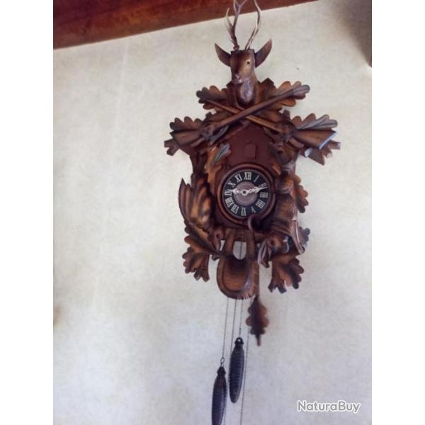 HORLOGE  COUCOU  KUNER  . FORET NOIRE .  ARTISANAL ALLEMAND  . PARFAIT  ETAT DE FONCTIONNEMENT .