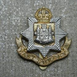 Insigne de casquette original de l'armée britannique du East Surrey Regiment