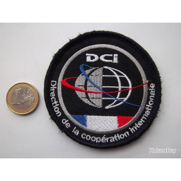 cusson direction de la coopration internationale (D.C.I.) insigne tissu
