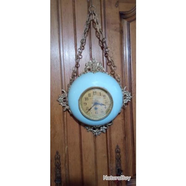 Horloge Boulangre tle et bronze XIXeme