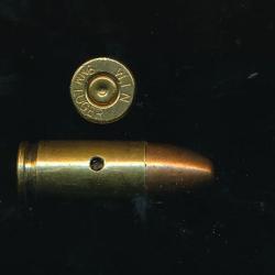 Une  cartouche de 9mm Para  Police en 1987 type Boxer FMJ par WINCHESTER