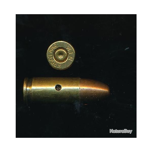 Une  cartouche de 9mm Para  Police en 1987 type Boxer FMJ par WINCHESTER