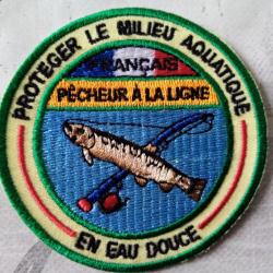 vend écusson neuf brodé pêcheur ,