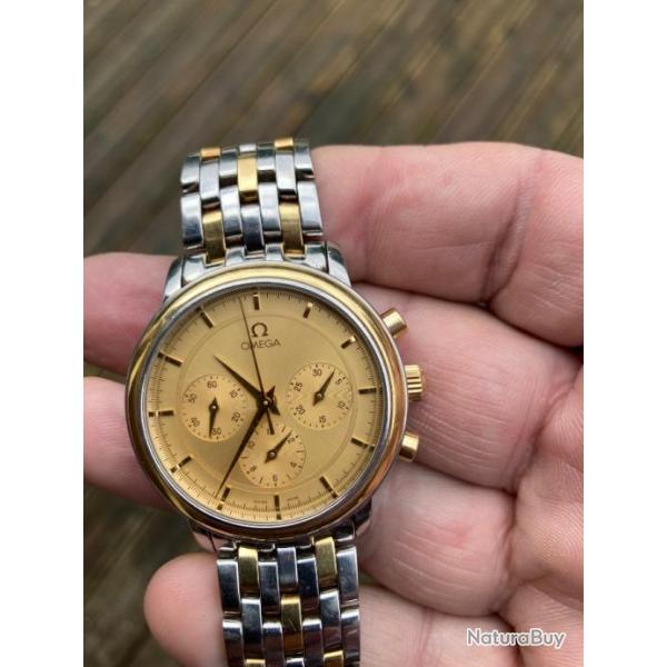 Montre omga deville prestige or et acier