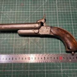 Ancien pistolet à broche