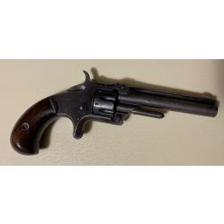 Smith and wesson 1 modele 3 eme issue calibre 22 short fonctionne parfaitement. Pas de jeux. 7 coups