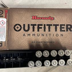 Boîte entamée, 11 cartouches Hornady Outfitter CX cal.338 Winchester Magnum, sans plomb.