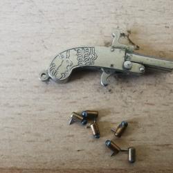 Pistolet Berloque 2mm broche et 6 cartouches balle plomb.