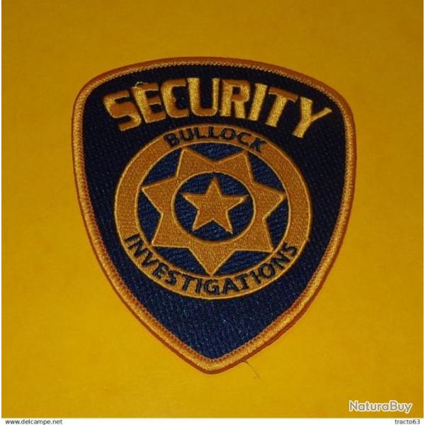 TISSU PATCH :SECURITY BULLOCK INVESTIGATIONS  , DIAMETRE 10CM , BON ETAT VOIR PHOTOS . POUR TOUT R