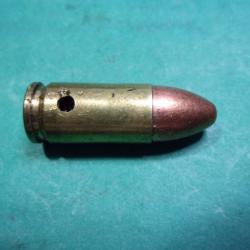 1 munition  9x19 Luger ( GECO 9 mm Luger ) étui laiton balle blindée cuivrée, neutralisée