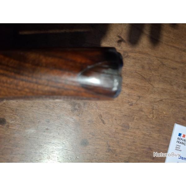 Crosse +longuesse 7400 remington avec  une fissure recolle et 2 petits impacts et sur la Crosse